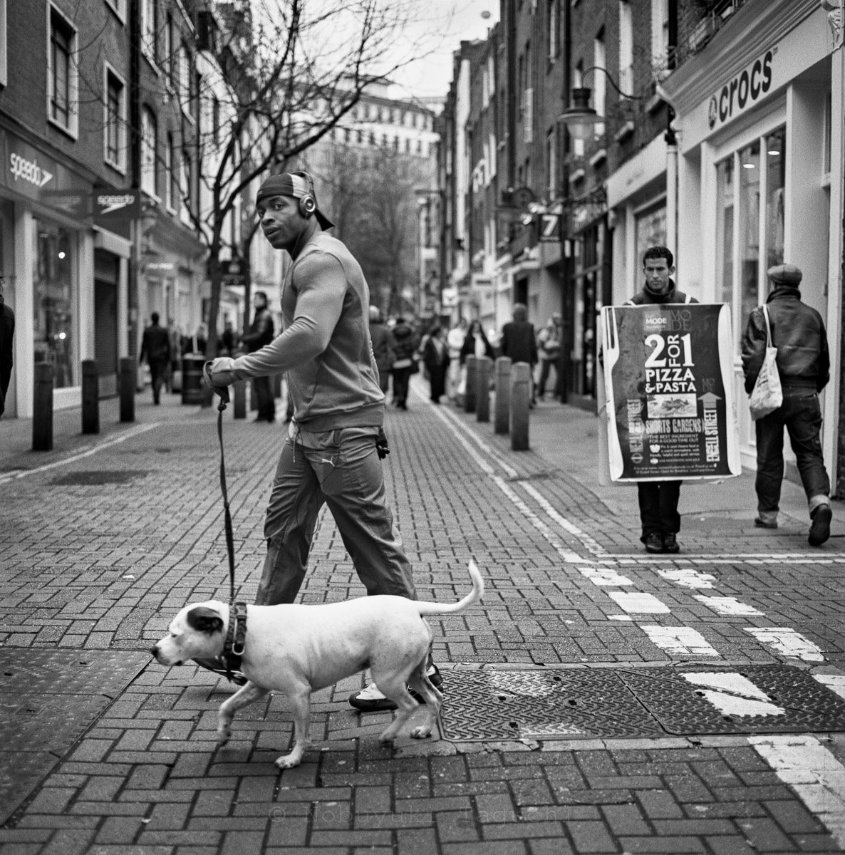 Street Photography London 120 Film  - Man with a dog, Neal Street, London WC2