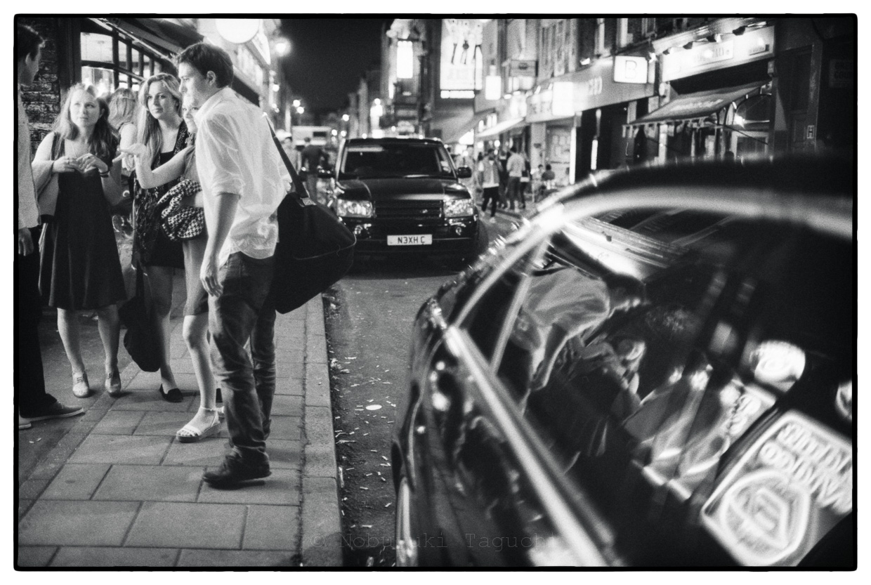 Street Photography London 2012 - Neon reflection